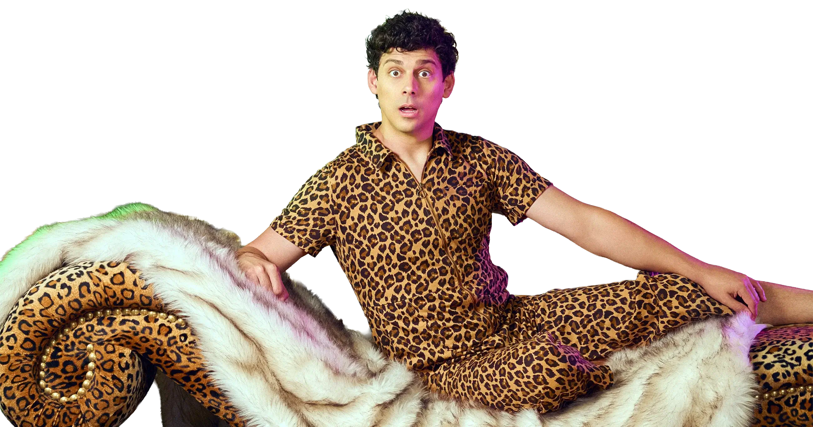 Matt reclining on a chez lounge, wearing a leopard print onesie